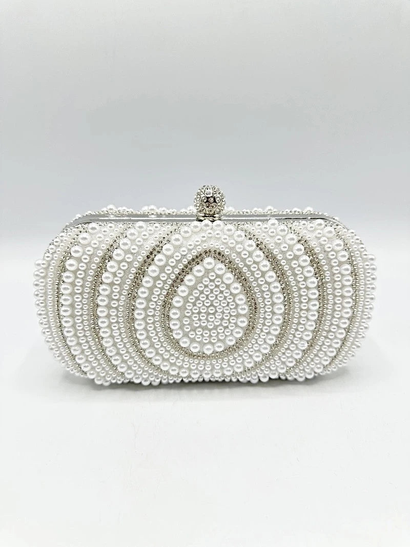 Minaudière con perlas y pedrería